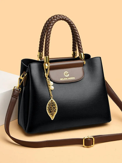 Real leather cowhide handbag for women 2026 new fashionable and versatile women's shoulder bag, large capacity crossbody mother