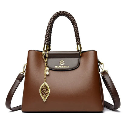 Real leather cowhide handbag for women 2026 new fashionable and versatile women's shoulder bag, large capacity crossbody mother